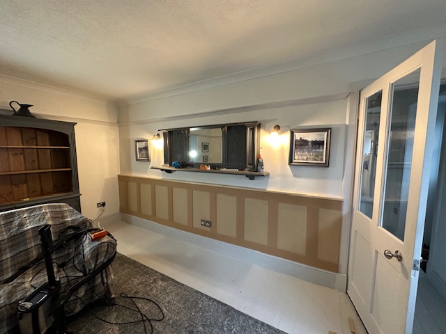 Custom wall paneling with neutral color scheme