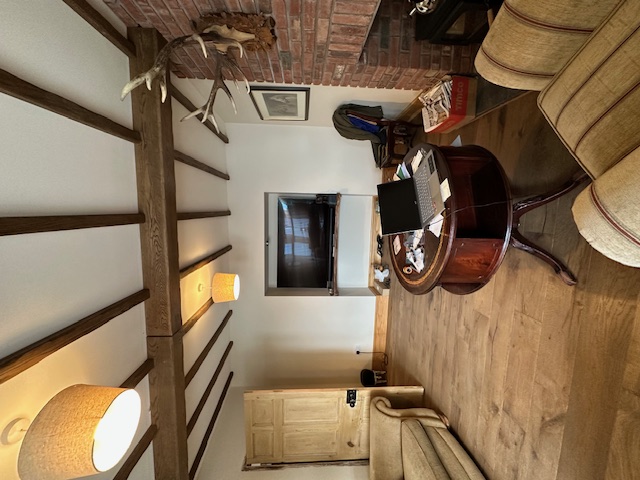 Living room with exposed timber beams