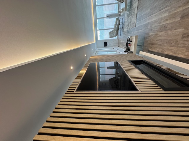 Modern vertical timber slat wall feature with LED lighting